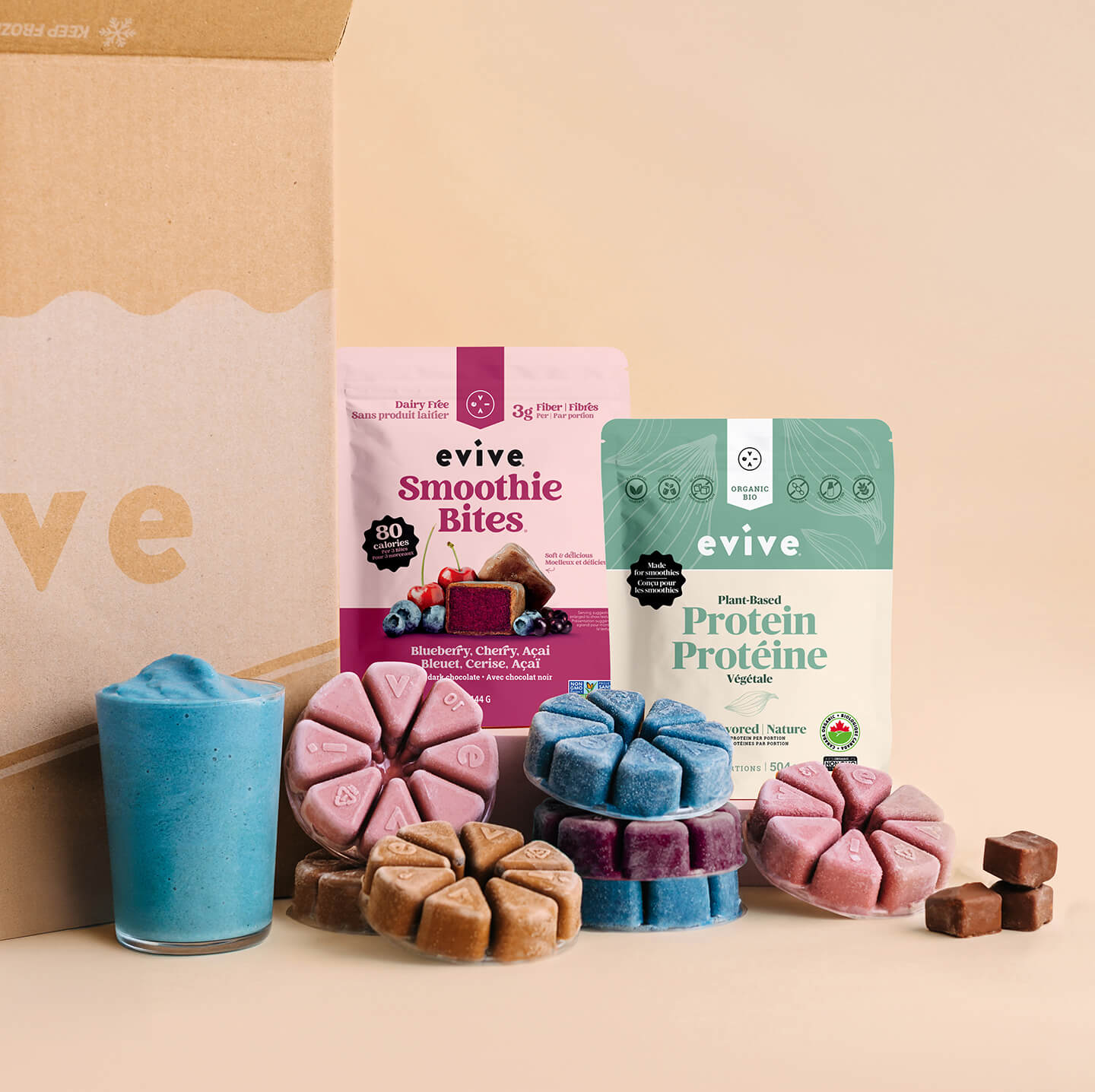 Colorful smoothie packs, blender, and smoothie bites with a 50% discount sign on a purple background.